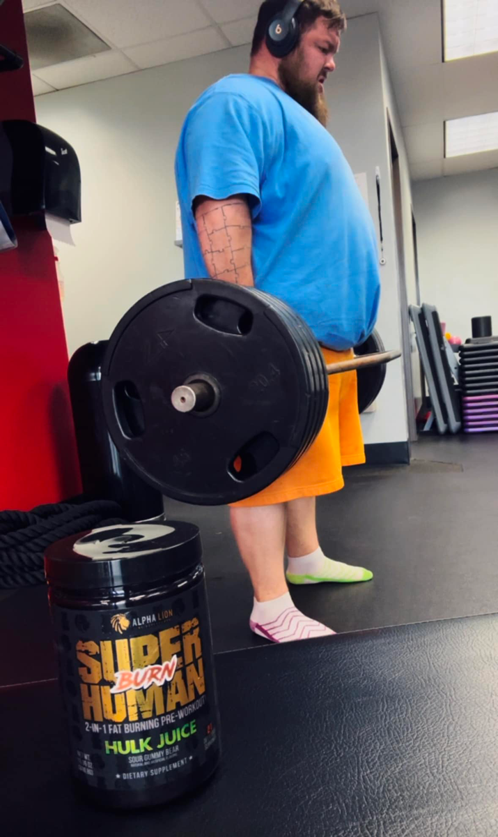 Coach Matt is deadlifting.